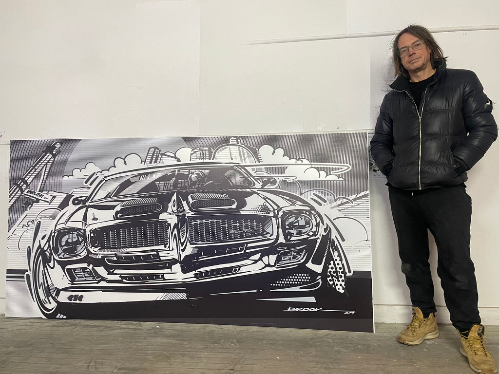BROOK standing beside the large Formula 400 automotive artwork